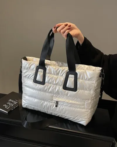 Stylish quilted tote bag with contrast handles with glossy finish