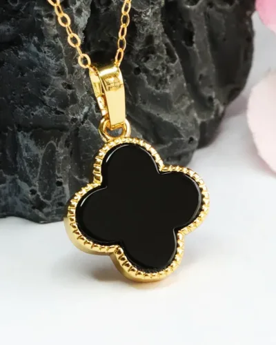A black clover shape gold plated  smart look pendant with anti tarnish chain