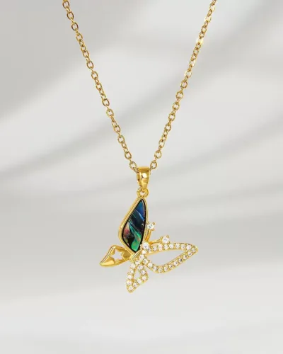A tiny and cute butterfly design pendant with a golden chain perfect for office and casual wear