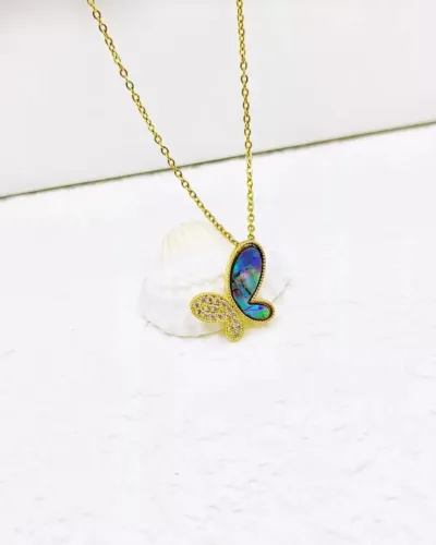 A tiny and cute butterfly design pendant with a golden chain perfect for office and casual wear