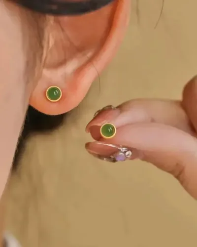 Beautiful  emerald twisted stud earing