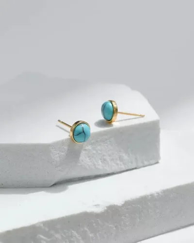 Beautiful  emerald twisted stud earing