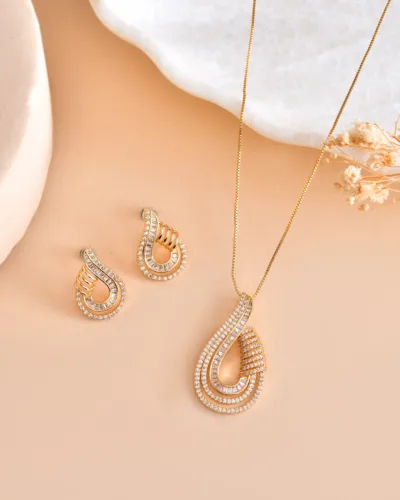 Luxury Teardrop Diamond Pendant  Set in Gold Finish with Matching Earrings